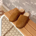 Mules en peau de mouton
