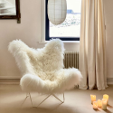 Fauteuil Butterfly AA original en peau de mouton Maison Thuret