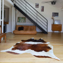 Peau de vache marron et blanc