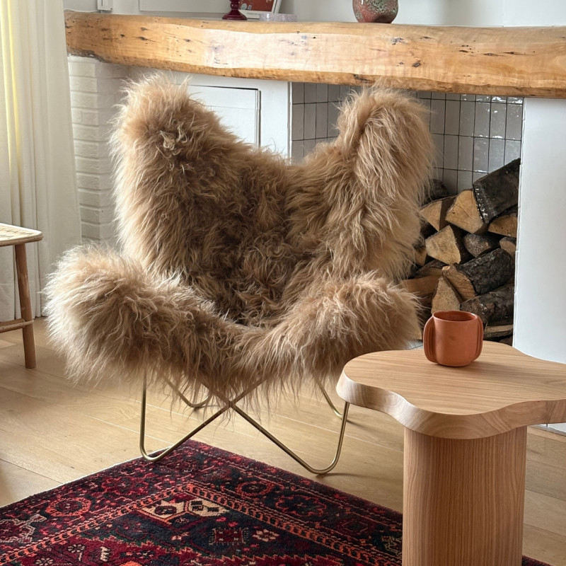 Fauteuil Butterfly AA original en peau de mouton Maison Thuret