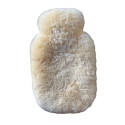 Bouillotte en Peau de Mouton – Chaleur Thérapeutique et Naturelle