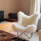 Fauteuil Butterfly AA original en peau de mouton Maison Thuret